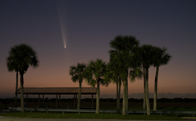 Comet Tsuchinshan-ATLAS, also known as C/2023 A3, appears in the skies over Melbourne, Florida on Sunday October 13, 2024. The rare comet last visited the solar system almost 80,000 years ago and will be visible at evening in the west for the coming days. (Photo by Joe Marino/UPI/Rex Features/Shutterstock)