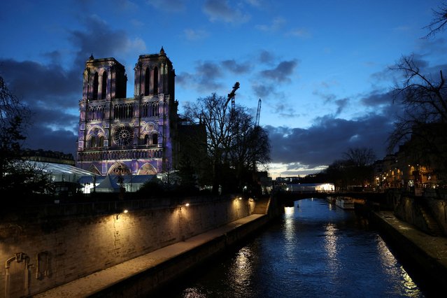 View of a light show rehearsal on the facade of the Notre-Dame de Paris Cathedral, which was ravaged by a fire in 2019, before the reopening ceremonies in Paris, France, on December 6, 2024. (Photo by Kevin Coombs/Reuters)