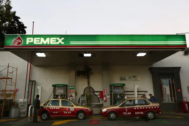 Taxis are seen at a Pemex gas station in Mexico City, January 13, 2015. (Photo by Edgard Garrido/Reuters)