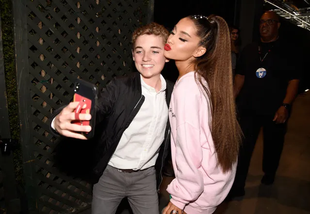 Ryan McKenna (L) and Ariana Grande pose for a selfie photo backstage at the 2018 iHeartRadio Wango Tango by AT&T at Banc of California Stadium on June 2, 2018 in Los Angeles, California. (Photo by Kevin Mazur/Getty Images for iHeartMedia)