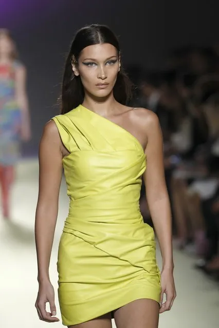 Model Bella Hadid wears a creation as part of Versace's women's 2019 Spring-Summer collection, unveiled during the Fashion Week in Milan, Italy, Friday, September 21, 2018. (Photo by Antonio Calanni/AP Photo)