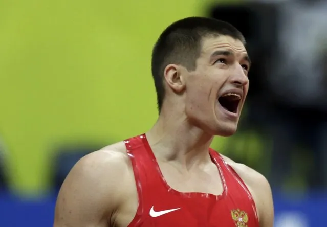 Ilya Shkurenyov of Russia celebrates after competing in the men's heptathlon 60 metres hurdles event during the IAAF European Indoor Championships in Prague March 8, 2015. REUTERS/David W Cerny (CZECH REPUBLIC  - Tags: SPORT ATHLETICS)  