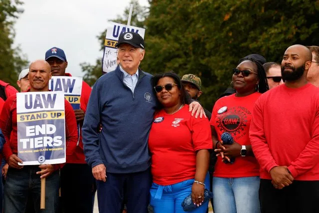 U.S. President Joe Biden joins striking members of the United Auto Workers (UAW) on the picket line outside the GM's Willow Run Distribution Center, in Belleville, Wayne County, Michigan, U.S., September 26, 2023. (Photo by Evelyn Hockstein/Reuters)