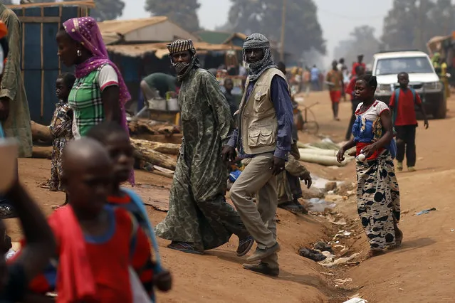 Muslim herders walk through the market  in Kaga-Bandoro, Central African Republic, Tuesday February 16,  2016. (Photo by Jerome Delay/AP Photo)