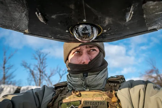 Ukrainian soldiers prepare a long range drone near the Bakhmut frontline, in Donetsk Oblast, Ukraine on January 12, 2024. Drone warfare has become increasingly important as the war entered into a stalemate and both sides are heavily fortified. (Photo by Ignacio Marin/Anadolu via Getty Images)