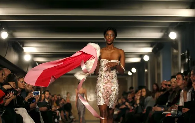 A model presents a creation by designer Rose Palhares, as part of her Fall/Winter 2016/17 collection, during Lisbon Fashion Week, Portugal, March 12, 2016. (Photo by Rafael Marchante/Reuters)