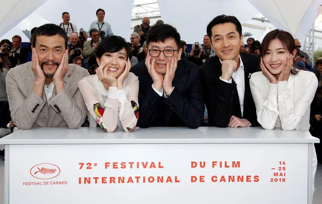 (FromL) Chinese actor Liao Fan, Chinese actress Gwei Lun Mei, Chinese director Diao Yinan, Chinese actor and singer Hu Ge and Chinese actress Wan Qian pose during a photocall for the film “The Wild Goose Lake (Nan Fang Che Zhan De Ju Hui)” at the 72nd edition of the Cannes Film Festival in Cannes, southern France, on May 19, 2019. (Photo by Jean-Paul Pelissier/Reuters)