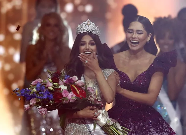 Miss India Harnaaz Sandhu (L) is crowned Miss Universe 2021 by Miss Universe 2020 Andrea Meza (R) from Mexico during the Miss Universe 2021 pageant in Eilat, Israel, 13 December 2021. Contestants from 80 countries and territories have been selected to compete in the Miss Universe 2021 pageant, held in the Red Sea resort of Eilat, Israel.  'Miss Universe 2020' Andrea Meza from Mexico will crown her successor at the end of the show. (Photo by Atef Safadi/EPA/EFE)