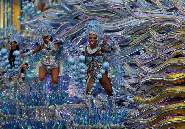 A reveller parades for the Aguia de Ouro samba school during the carnival in Sao Paulo, Brazil, February 25, 2017. (Photo by Paulo Whitaker/Reuters)