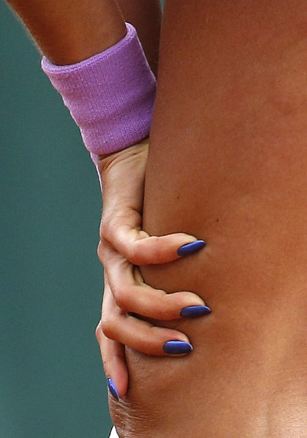 Vitalia Diatchenko of Russia's nails are seen as she concentrates during the women's singles match against Stefanie Voegele of Switzerland at the French Open tennis tournament at the Roland Garros stadium in Paris, France, May 25, 2015. (Photo by Vincent Kessler/Reuters)