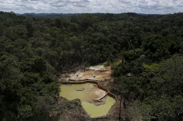 An illegal gold mine is seen during Brazil’s environmental agency operation against illegal gold mining on indigenous land, in the heart of the Amazon rainforest, in Roraima state, Brazil April 17, 2016. (Photo by Bruno Kelly/Reuters)