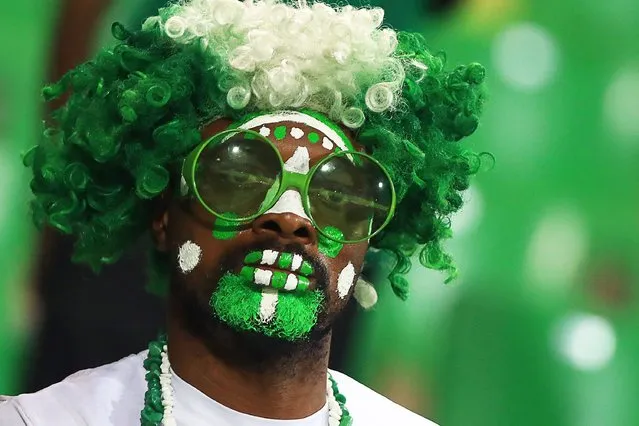 A Nigeria supporter poses prior to the Africa Cup of Nations (CAN) 2021 round of 16 football match between Nigeria and Tunisia at Stade Roumde Adjia in Garoua on January 23, 2022. (Photo by Daniel Beloumou Olomo/AFP Photo)