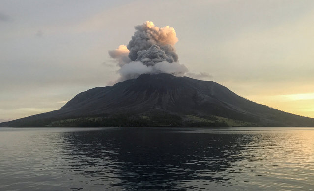Mount Ruang volcano spews volcanic ash as seen from Tagulandang in Sitaro Islands Regency, North Sulawesi province, Indonesia on April 19, 2024. (Photo by Chermanto Tjaombah/Reuters)