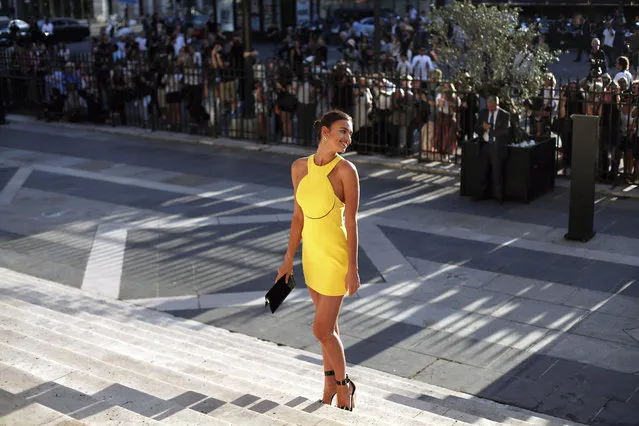 Russian model Irina Shayk arrives for the Versace's fall-winter 2015/2016 Haute Couture fashion collection presented in Paris, France, Sunday, July 5, 2015. (Photo by Thibault Camus/AP Photo)