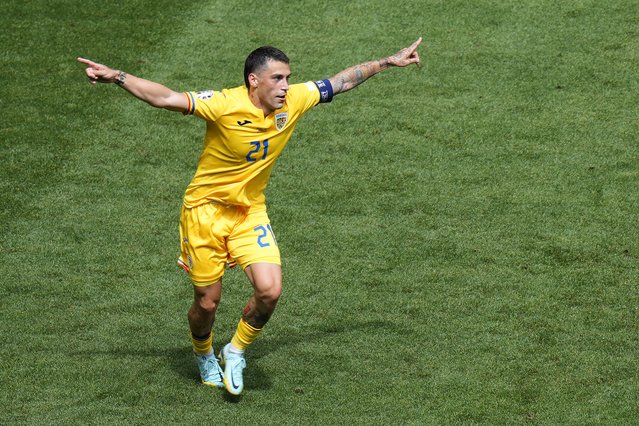 Romania's Nicolae Stanciu celebrates after scoring the opening goal against Ukraine during a Group E match between Romania and Ukraine at the Euro 2024 soccer tournament in Munich, Germany, Monday, June 17, 2024. (Photo by Ariel Schalit/AP Photo)
