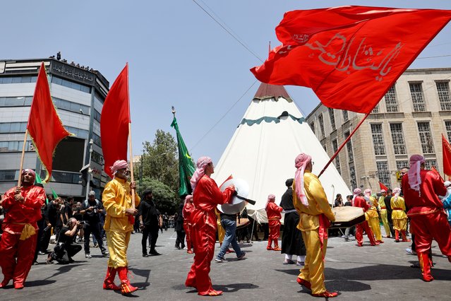 Iranian Shi'ite Muslims attend a ceremony to mark Ashura, the holiest day on the Shi'ite Muslim calendar, in Tehran, Iran on July 16, 2024  (Photo by Majid Asgaripour/WANA (West Asia News Agency) via Reuters)