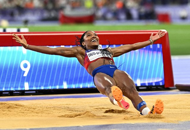 US' Tara Davis-Woodhall competes in the women's long jump final of the athletics event at the Paris 2024 Olympic Games at Stade de France in Saint-Denis, north of Paris, on August 8, 2024. (Photo by Dylan Martinez/Reuters)