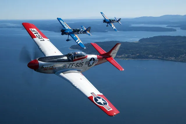Air National Guard and the Heritage Flight Museum's P-51 Mustang takes to the skies at Seafair 2015 on Thurs., July 30, 2015 in Seattle, Wash. (Photo by Matt Mills McKnight/AP Images for John Klatt Airshows, Inc.)
