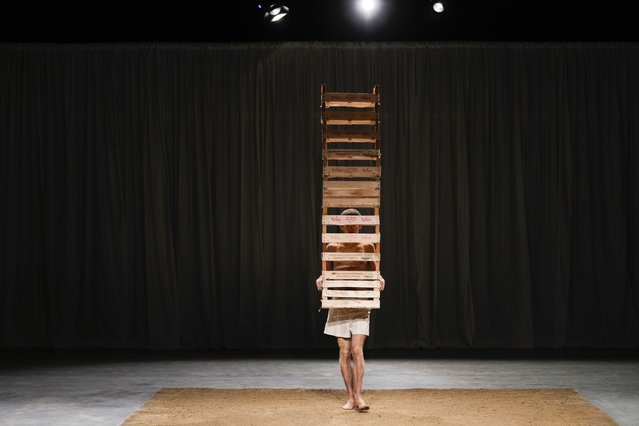 A model wears a creation as part of the Federico Cina men's Spring Summer 2024 collection presented in Milan, Italy, Saturday, June 17, 2023. (Photo by Luca Bruno/AP Photo)