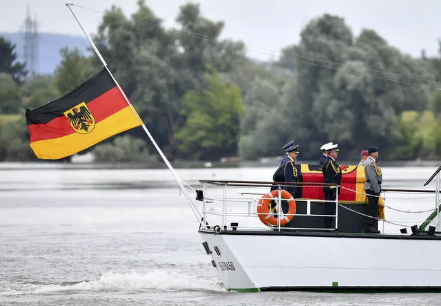 The coffin of late former German Chancellor Helmut Kohl is pictured on the MS Mainz on the way from Reffenthal to Speyer, Germany, July 1, 2017. (Photo by Uwe Anspach/Reuters)