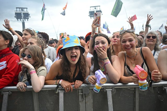 Revellers dance as they attend the Glastonbury Festival at Worthy Farm, in Pilton near Glastonbury, Somerset, Britain, on June 28, 2024. (Photo by Dylan Martinez/Reuters)