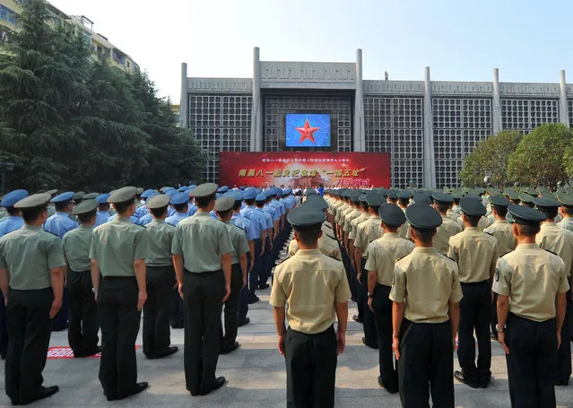Military soldiers and officers attend an opening ceremony of Memorial of the August 1 Nanchang Uprising after a renovation ahead of the 90th anniversary of the founding of the People's Liberation Army (PLA) in Nanchang, Jiangxi province, China July 28, 2017. (Photo by Reuters/China Stringer Network)