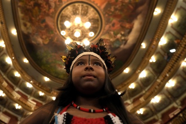 Maira Tembe stands inside Teatro da Paz before the start of a ceremony to present Brazil's national Indigenous census in Belem, Brazil, Monday, August 7, 2023. Belem will host the Amazon Summit, a meeting by the nations that are part of the Amazon Cooperation Treaty: Brazil, Bolivia, Colombia, Guyana, Ecuador, Peru, Suriname, Venezuela and French Guiana. (Photo by Eraldo Peres/AP Photo)