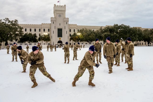 Citadel cadets engage in a snowball fight during a very rare snow day to their campus on Wednesday January 22, 2025 in Charleston, S.C. (Photo by Ed Wray/The Citadel via AP Photo)