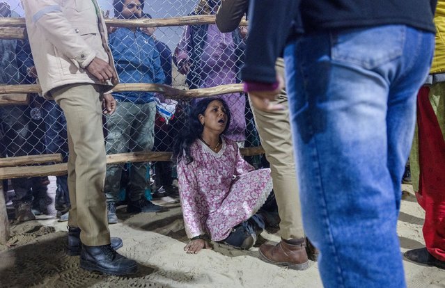 A devotee is seen shocked after a deadly stampede before the second “Shahi Snan” (royal bath), at the “Maha Kumbh Mela” or the Great Pitcher Festival in Prayagraj, India on January 29, 2025. (Photo by Adnan Abidi/Reuters)