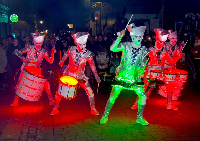 Gravesend's Light Festival brightens up the dark days of winter in Gravesend, Kent, UK on January 26, 2024. Throughout the town there are art installations and performers engaging with the town's residents and visitors. Image shows the LED Drummers a spectacular percussion group of robotic performers that change colour following the beat of their drums. (Photo by Fraser Gray/Rex Features/Shutterstock)