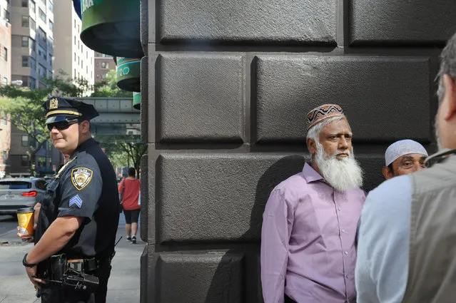 A member of the New York City police stands guard before the start of the annual Muslim Day Parade in the Manhattan borough of New York City, September 25, 2016. (Photo by Stephanie Keith/Reuters)