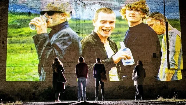 Images from the films Trainspotting and The Illusionist, both set in Edinburgh, are projected onto a derelict site by Double Take Projections in Leith, Edinburgh, Scotland on September 29, 2020, during a test screening for Cinescapes. (Photo by Jane Barlow/PA Images via Getty Images)