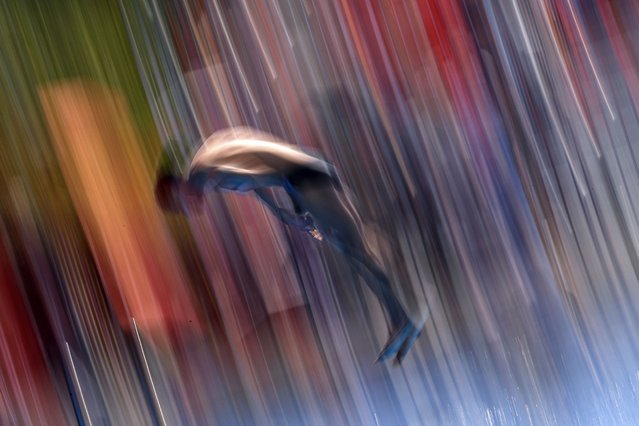 Manuel Gil Juan of Colombia competes during the Men’s 27m High Diving events at the World Aquatics Championships Singapore 2025 in Singapore, 24 July 2025. (Photo by Rungroj Yongrit/EPA)