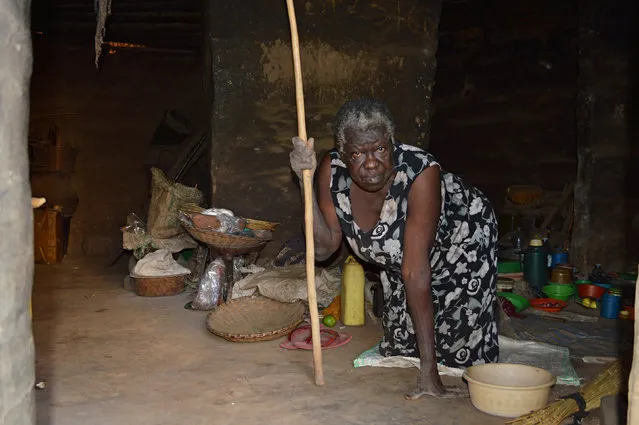 Martha Akot 69, aunt of Alfred Olango, is seen inside her clay built house as she mourns her nephew's shooting by policemen in the San Diego suburb of El Cajon, California, on the outskirt of Gulu, Uganda September 29, 2016. (Photo by James Akena/Reuters)