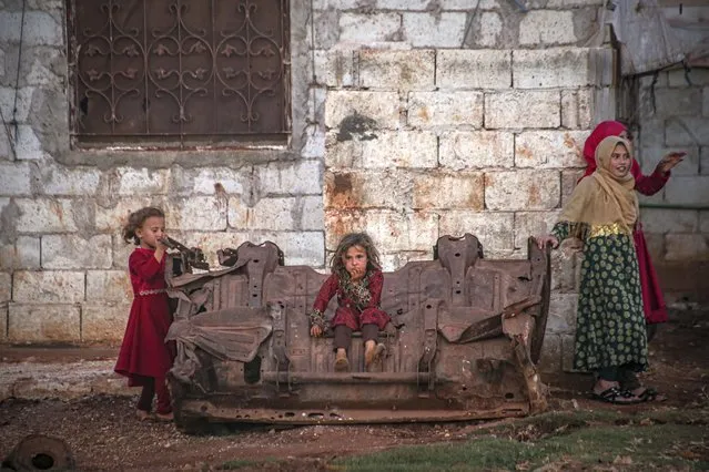 Displaced Syrians are seen near their makeshift tents at the Atme village of Idlib, Syria on October 16, 2020. In Syria, the civilians who fled from the air strikes of Assad regime and settled in Idlib's border with Turkey, live in unhealthy conditions in the tents they have established on their owns. (Photo by Muhammed Said/Anadolu Agency via Getty Images)