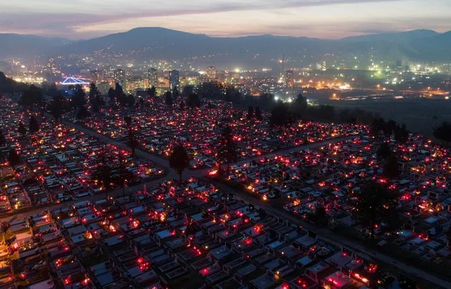 Aerial view of cemetery on Crkvicko hill during All Saints' Day in Zenica, Bosnia and Herzegovina on November 1, 2020. (Photo by Dado Ruvic/Reuters)