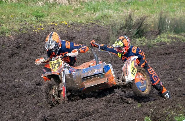 Very muddy sidecar motocross races took place on Sunday, April 16, 2023 at Wakes Colne circuit near Colchester in Essex for the ACU British Sidecar Cross Championship. The muddy race track had to be regularly levelled off by an excavator during the day to make it ridable, although plenty got stuck. (Photo by Kevin Jay/Picture Exclusive)