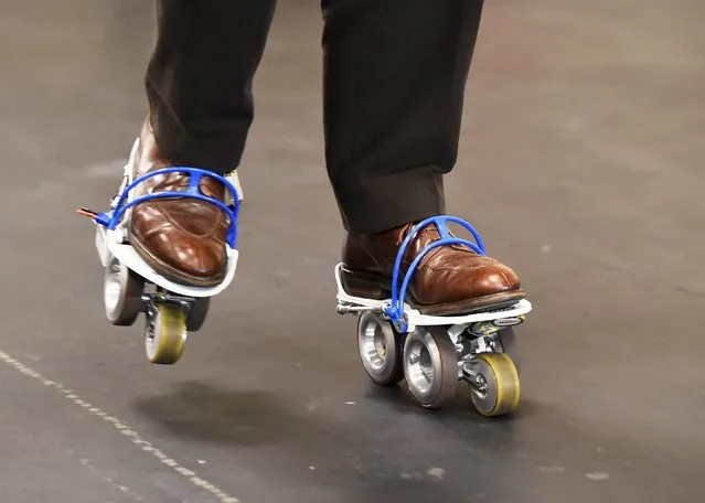 The Rollkers, a transportation accessory that increases a person's average walking rate up to 7 miles per hour, is seen in use on January 4, 2014 before the start of the 2015 Consumer Electronics Show in Las Vegas, Nevada. (Photo by Robyn Beck/AFP Photo)