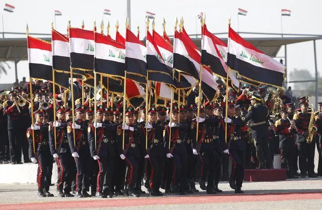 Soldiers march as they participate in their graduation ceremony during Iraqi Army Day anniversary celebration in Baghdad January 6, 2015. (Photo by Thaier al-Sudani/Reuters)