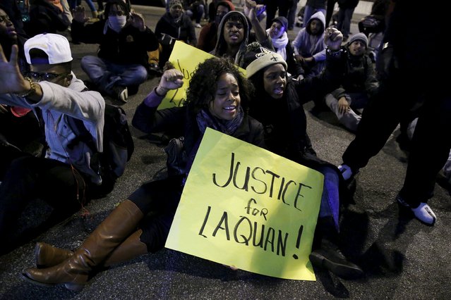 Protesters demonstrate in response to the fatal shooting of Laquan McDonald in Chicago, Illinois, November 25, 2015. (Photo by Andrew Nelles/Reuters)