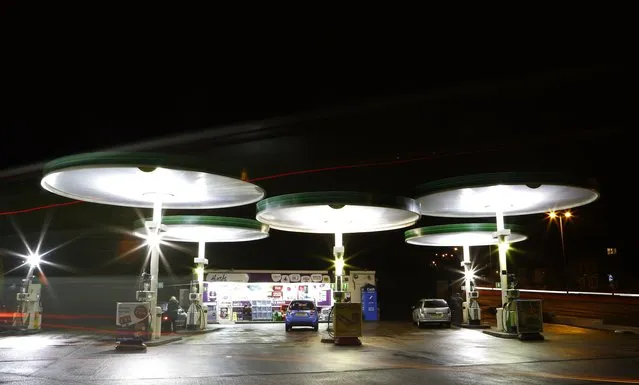 Cars are seen at the Grade II listed BP petrol station designed by Eliot Noyes in the 1960s at Birstall, central England January 7, 2015. (Photo by Darren Staples/Reuters)