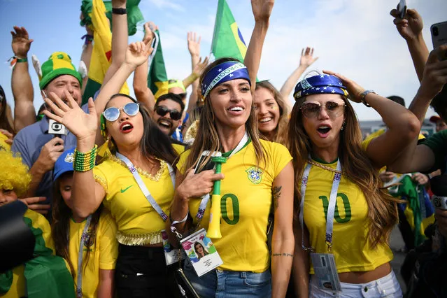 Brazil fans enjoy the pre match atmosphere during the 2018 FIFA World Cup Russia Round of 16 match between Brazil and Mexico at Samara Arena on July 2, 2018 in Samara, Russia.  (Photo by Matthias Hangst/Getty Images)