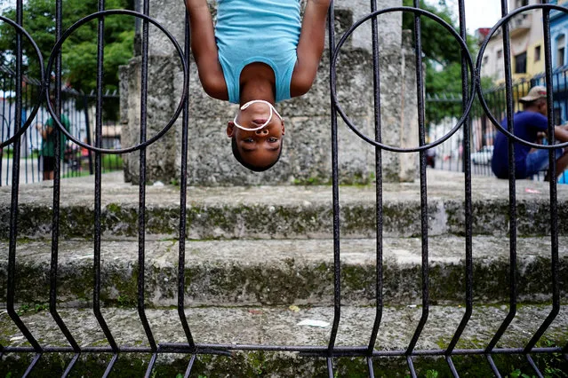 Yandel Pluma, 8, plays in a park in Havana, Cuba, June 11, 2018. (Photo by Alexandre Meneghini/Reuters)