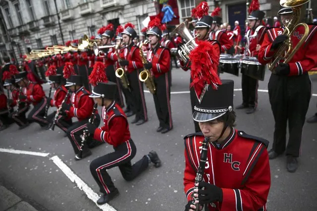 Members of the Hinsdale Central High School Red Devil marching band perform during the New Year's Day Parade in London, Britain January 1, 2016. (Photo by Neil Hall/Reuters)