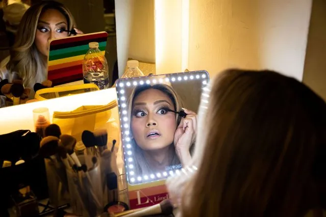 Adrian Reyes, representing Canada, prepares backstage before competing in the Miss International Queen pageant on June 24, 2023 in Pattaya, Thailand. Thailand hosts Miss International Queen, the largest and most prestigious international transgender beauty pageant. The pageant, held annually in Pattaya, Thailand is held takes place during Pride month. Throughout Thailand, Thai LGBTQ activists have held Pride events calling for equality and pressuring the incoming government to move forward with legislation that would allow marriage for all. (Photo by Lauren DeCicca/Getty Images)