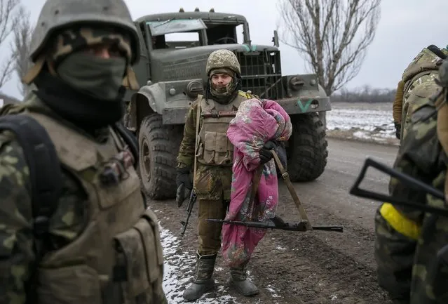 Ukrainian servicemen who fought in Debaltseve are seen near Artemivsk February 19, 2015. (Photo by Gleb Garanich/Reuters)