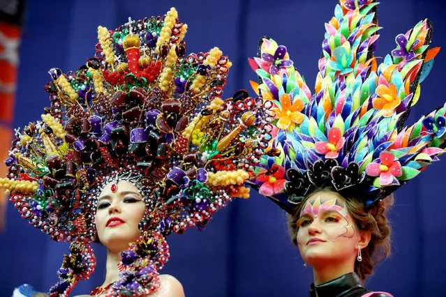 Women wearing kokoshniks (Russian traditional headdress) during a Nevskiye Berega (Neva Banks) beauty festival in St Petersburg, Russia on September 29, 2018. (Photo by Peter Kovalev/TASS News Agency/Alamy Live News)