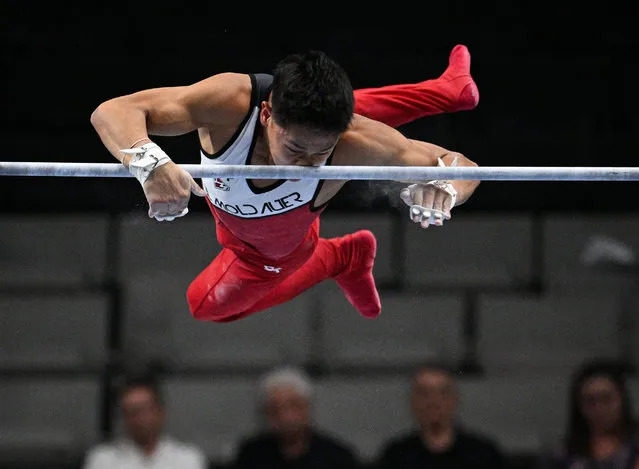 Gymnast Yul Moldauer falls while competing in the men's horizontal bar on the final day of men's competition at the 2023 US Gymnastics Championships at the SAP Center on August 26, 2023 in San Jose, California. A total of 147 gymnasts have qualified to participate in the Championships, where they will compete for titles and a spot on the US National Team. (Photo by Loren Elliott/AFP Photo)