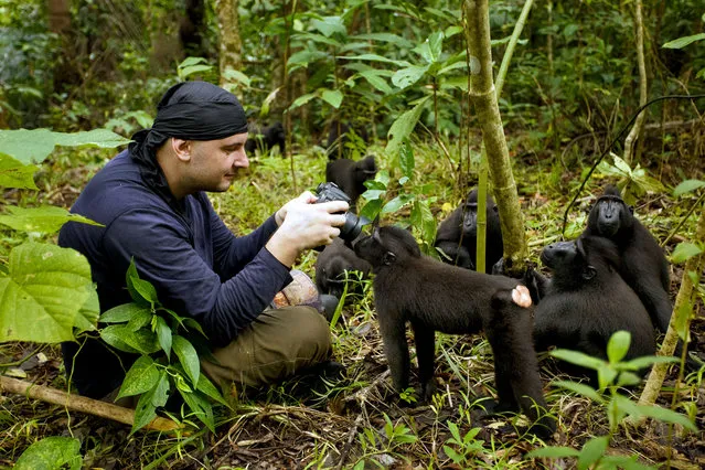 Photograoher Petr Bambousek takes a close-up portrait in the jungle. (Photo by Petr Bambousek/Caters News Agency)