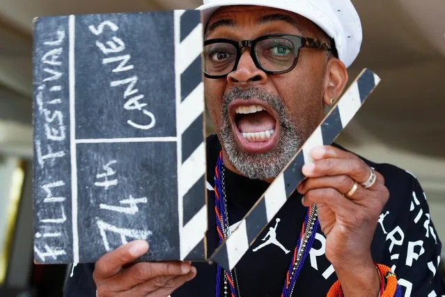 Spike Lee, Jury President of the 74th Cannes Film Festival, holds a film clapper before the opening of the Cannes film festival on July 06, 2021 in Cannes, France. (Photo by Eric Gaillard/Reuters)